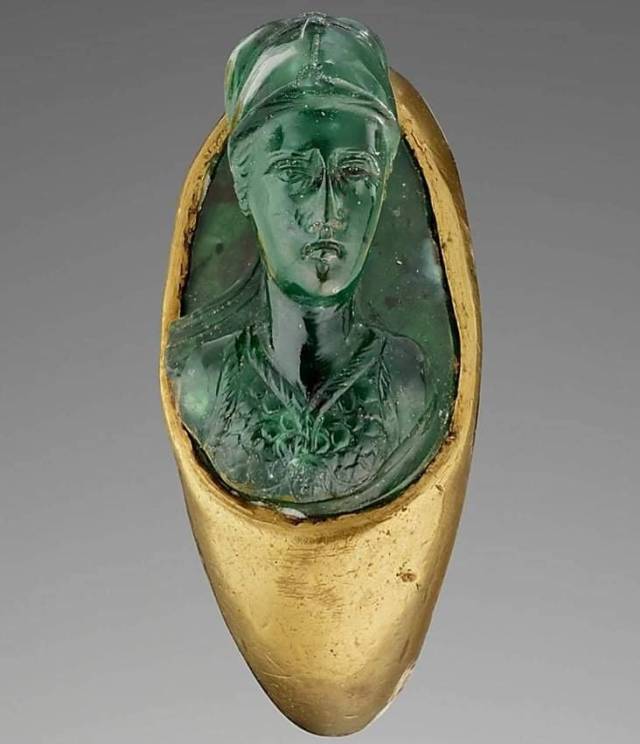 The goddess Minerva depicted on the bezel of a Roman gold ring from the 1st century AD. J. Paul…