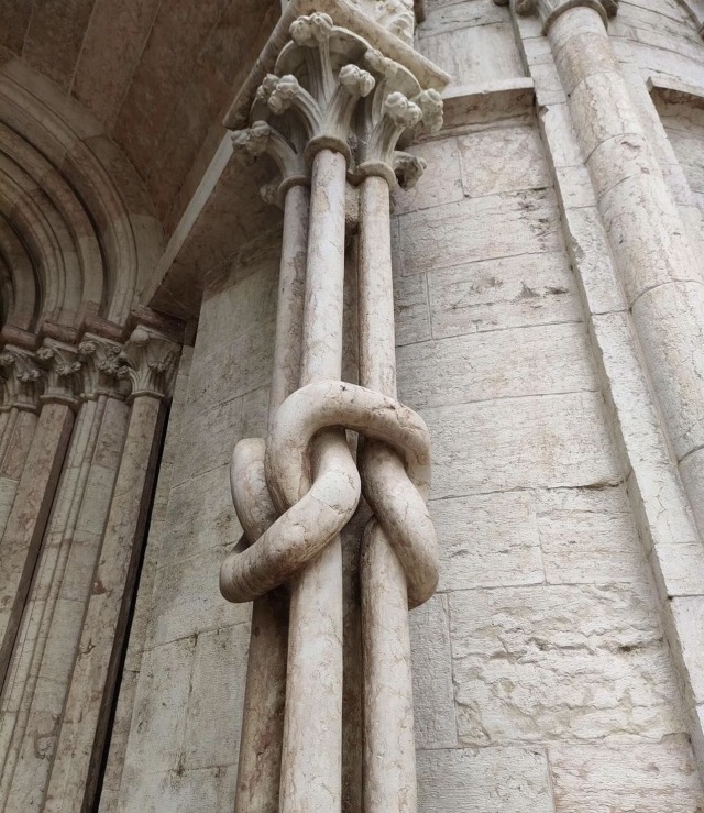 Four marble columns knotted, located at the Trento Cathedral in Italy, 13th century CE.